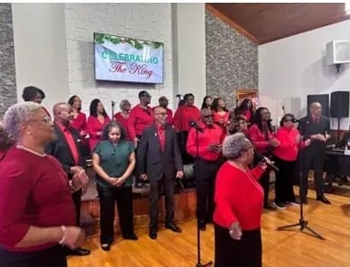 Church choir in red performing during service